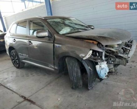 Коричневий Міцубісі Аутлендер, об'ємом двигуна 2 л та пробігом 128 тис. км за 6500 $, фото 1 на Automoto.ua