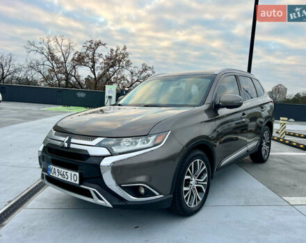 Коричневий Міцубісі Аутлендер, об'ємом двигуна 2.4 л та пробігом 192 тис. км за 19500 $, фото 1 на Automoto.ua