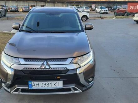 Коричневый Мицубиси Аутлендер, объемом двигателя 2 л и пробегом 175 тыс. км за 17900 $, фото 1 на Automoto.ua