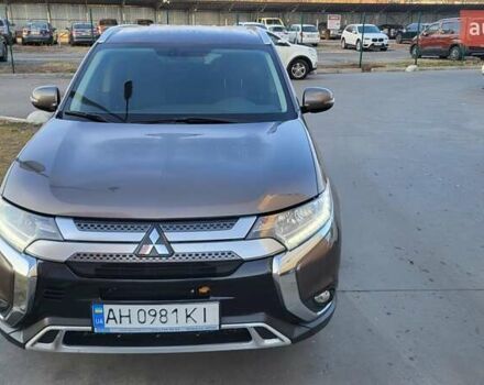 Коричневый Мицубиси Аутлендер, объемом двигателя 2 л и пробегом 175 тыс. км за 17900 $, фото 1 на Automoto.ua