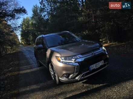 Коричневый Мицубиси Аутлендер, объемом двигателя 2.36 л и пробегом 69 тыс. км за 19700 $, фото 1 на Automoto.ua