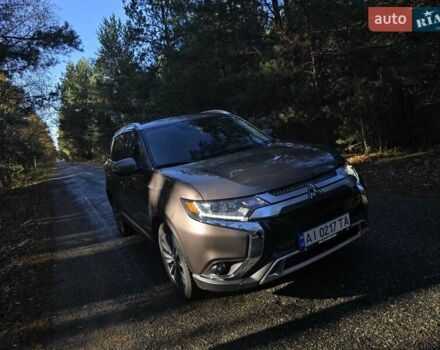 Коричневый Мицубиси Аутлендер, объемом двигателя 2.36 л и пробегом 69 тыс. км за 19700 $, фото 1 на Automoto.ua