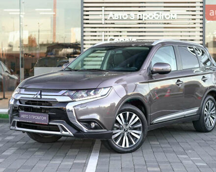 Коричневий Міцубісі Аутлендер, об'ємом двигуна 2.36 л та пробігом 80 тис. км за 24320 $, фото 1 на Automoto.ua