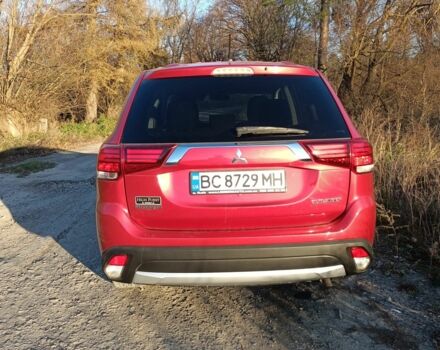 Червоний Міцубісі Аутлендер, об'ємом двигуна 2.4 л та пробігом 118 тис. км за 13000 $, фото 12 на Automoto.ua