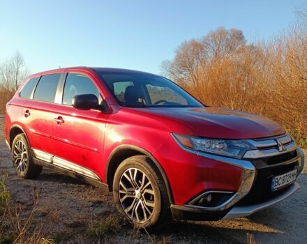 Червоний Міцубісі Аутлендер, об'ємом двигуна 2.4 л та пробігом 118 тис. км за 13000 $, фото 10 на Automoto.ua