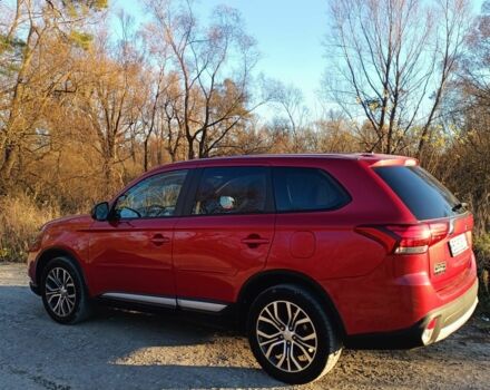 Червоний Міцубісі Аутлендер, об'ємом двигуна 2.4 л та пробігом 118 тис. км за 13000 $, фото 2 на Automoto.ua