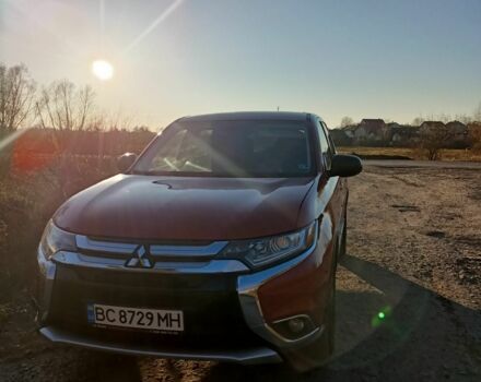 Червоний Міцубісі Аутлендер, об'ємом двигуна 2.4 л та пробігом 118 тис. км за 13000 $, фото 3 на Automoto.ua
