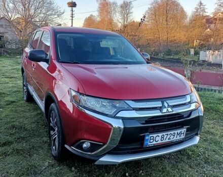 Червоний Міцубісі Аутлендер, об'ємом двигуна 2.4 л та пробігом 118 тис. км за 13000 $, фото 1 на Automoto.ua