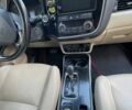 Красный Мицубиси Аутлендер, объемом двигателя 2.36 л и пробегом 160 тыс. км за 14000 $, фото 9 на Automoto.ua