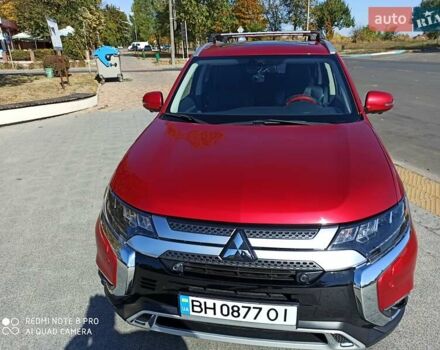 Червоний Міцубісі Аутлендер, об'ємом двигуна 2.4 л та пробігом 70 тис. км за 18500 $, фото 4 на Automoto.ua