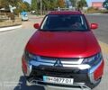 Червоний Міцубісі Аутлендер, об'ємом двигуна 2.4 л та пробігом 70 тис. км за 18500 $, фото 4 на Automoto.ua