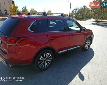 Червоний Міцубісі Аутлендер, об'ємом двигуна 2.4 л та пробігом 70 тис. км за 18500 $, фото 15 на Automoto.ua