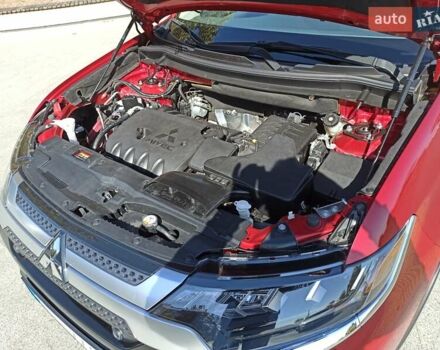 Червоний Міцубісі Аутлендер, об'ємом двигуна 2.4 л та пробігом 70 тис. км за 18500 $, фото 1 на Automoto.ua