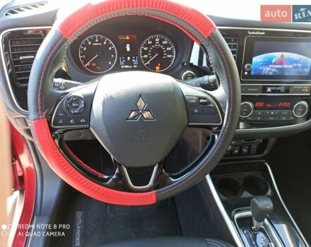 Червоний Міцубісі Аутлендер, об'ємом двигуна 2.4 л та пробігом 70 тис. км за 18500 $, фото 8 на Automoto.ua