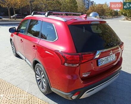 Червоний Міцубісі Аутлендер, об'ємом двигуна 2.4 л та пробігом 70 тис. км за 18500 $, фото 14 на Automoto.ua