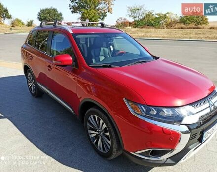 Червоний Міцубісі Аутлендер, об'ємом двигуна 2.4 л та пробігом 70 тис. км за 18500 $, фото 16 на Automoto.ua