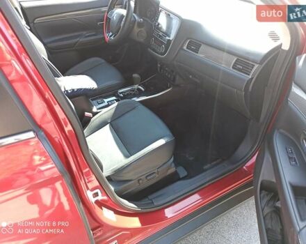Червоний Міцубісі Аутлендер, об'ємом двигуна 2.4 л та пробігом 70 тис. км за 18500 $, фото 6 на Automoto.ua
