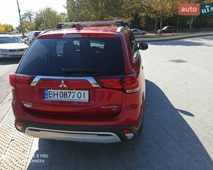 Червоний Міцубісі Аутлендер, об'ємом двигуна 2.4 л та пробігом 70 тис. км за 18500 $, фото 10 на Automoto.ua