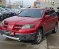 Червоний Міцубісі Аутлендер, об'ємом двигуна 2.4 л та пробігом 226 тис. км за 5490 $, фото 1 на Automoto.ua
