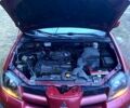 Червоний Міцубісі Аутлендер, об'ємом двигуна 2 л та пробігом 209 тис. км за 6000 $, фото 11 на Automoto.ua