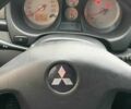 Красный Мицубиси Аутлендер, объемом двигателя 2 л и пробегом 344 тыс. км за 4300 $, фото 4 на Automoto.ua