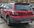 Красный Мицубиси Аутлендер, объемом двигателя 2.4 л и пробегом 226 тыс. км за 5440 $, фото 10 на Automoto.ua