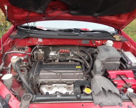 Красный Мицубиси Аутлендер, объемом двигателя 2 л и пробегом 217 тыс. км за 6250 $, фото 7 на Automoto.ua