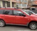 Красный Мицубиси Аутлендер, объемом двигателя 2 л и пробегом 340 тыс. км за 4300 $, фото 1 на Automoto.ua