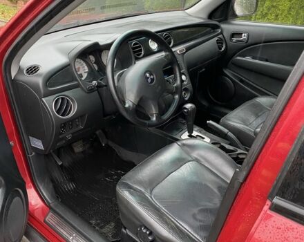 Красный Мицубиси Аутлендер, объемом двигателя 2.4 л и пробегом 293 тыс. км за 3595 $, фото 6 на Automoto.ua