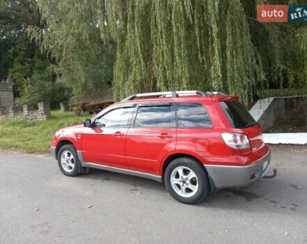 Красный Мицубиси Аутлендер, объемом двигателя 2 л и пробегом 217 тыс. км за 6250 $, фото 7 на Automoto.ua