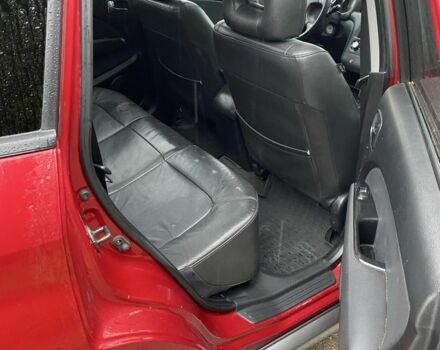 Красный Мицубиси Аутлендер, объемом двигателя 2.4 л и пробегом 293 тыс. км за 3595 $, фото 4 на Automoto.ua