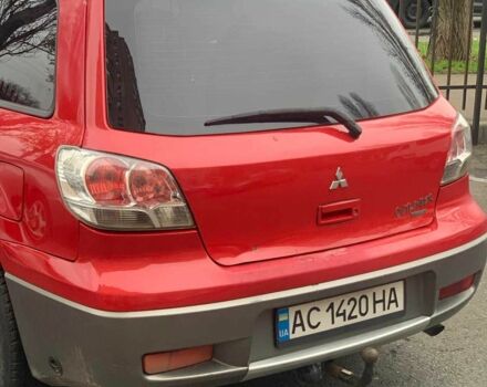 Красный Мицубиси Аутлендер, объемом двигателя 2 л и пробегом 344 тыс. км за 4300 $, фото 8 на Automoto.ua