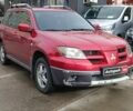 Красный Мицубиси Аутлендер, объемом двигателя 2.4 л и пробегом 226 тыс. км за 5440 $, фото 5 на Automoto.ua