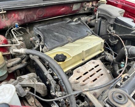 Красный Мицубиси Аутлендер, объемом двигателя 2.4 л и пробегом 174 тыс. км за 6900 $, фото 17 на Automoto.ua