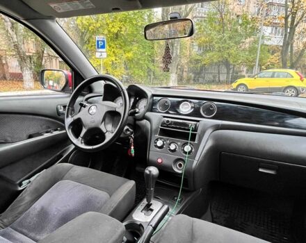 Красный Мицубиси Аутлендер, объемом двигателя 2.4 л и пробегом 174 тыс. км за 6900 $, фото 12 на Automoto.ua