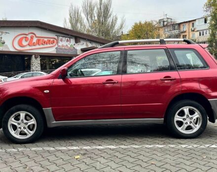 Красный Мицубиси Аутлендер, объемом двигателя 2.4 л и пробегом 174 тыс. км за 6900 $, фото 6 на Automoto.ua