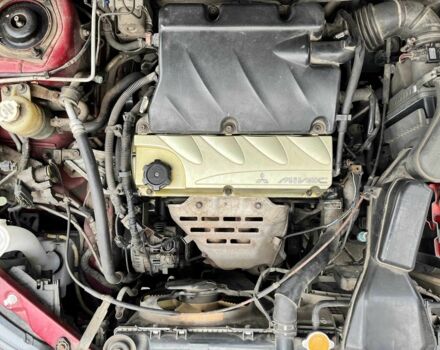 Красный Мицубиси Аутлендер, объемом двигателя 2.4 л и пробегом 174 тыс. км за 6900 $, фото 16 на Automoto.ua