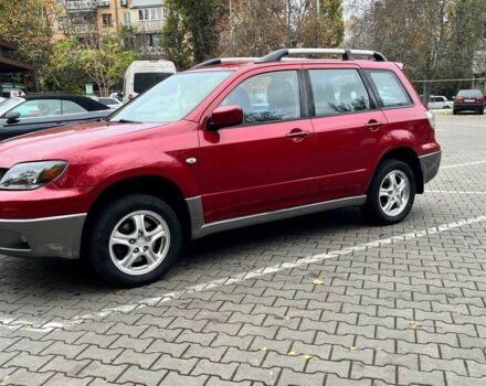 Красный Мицубиси Аутлендер, объемом двигателя 2.4 л и пробегом 174 тыс. км за 6900 $, фото 5 на Automoto.ua