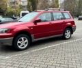 Красный Мицубиси Аутлендер, объемом двигателя 2.4 л и пробегом 174 тыс. км за 6900 $, фото 5 на Automoto.ua