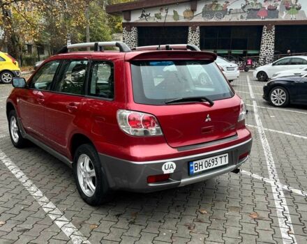 Красный Мицубиси Аутлендер, объемом двигателя 2.4 л и пробегом 174 тыс. км за 6900 $, фото 8 на Automoto.ua