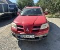 Червоний Міцубісі Аутлендер, об'ємом двигуна 2.4 л та пробігом 235 тис. км за 3999 $, фото 1 на Automoto.ua