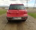 Червоний Міцубісі Аутлендер, об'ємом двигуна 2.4 л та пробігом 270 тис. км за 5250 $, фото 4 на Automoto.ua
