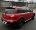 Красный Мицубиси Аутлендер, объемом двигателя 2.4 л и пробегом 224 тыс. км за 5600 $, фото 6 на Automoto.ua