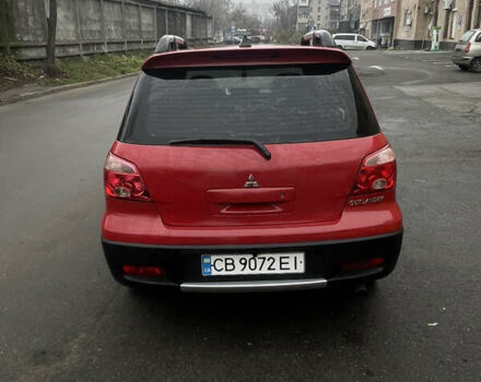 Красный Мицубиси Аутлендер, объемом двигателя 2.4 л и пробегом 224 тыс. км за 5600 $, фото 5 на Automoto.ua