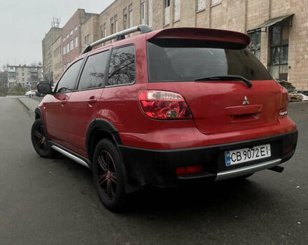 Красный Мицубиси Аутлендер, объемом двигателя 2.4 л и пробегом 224 тыс. км за 5600 $, фото 4 на Automoto.ua