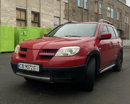 Красный Мицубиси Аутлендер, объемом двигателя 2.4 л и пробегом 224 тыс. км за 5600 $, фото 2 на Automoto.ua