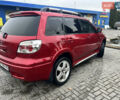 Червоний Міцубісі Аутлендер, об'ємом двигуна 2.4 л та пробігом 187 тис. км за 5600 $, фото 2 на Automoto.ua