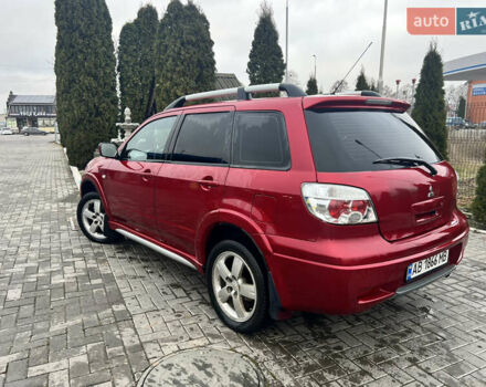 Червоний Міцубісі Аутлендер, об'ємом двигуна 2.4 л та пробігом 187 тис. км за 5600 $, фото 4 на Automoto.ua
