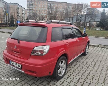 Красный Мицубиси Аутлендер, объемом двигателя 2.4 л и пробегом 269 тыс. км за 5700 $, фото 8 на Automoto.ua