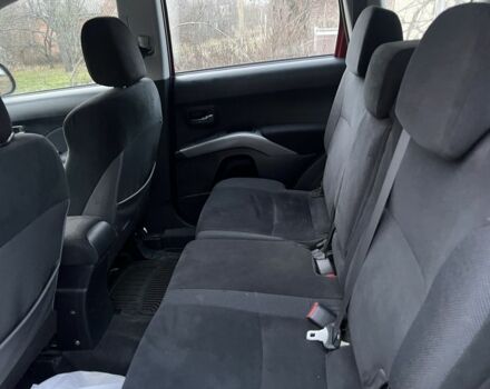 Красный Мицубиси Аутлендер, объемом двигателя 2 л и пробегом 290 тыс. км за 4700 $, фото 6 на Automoto.ua